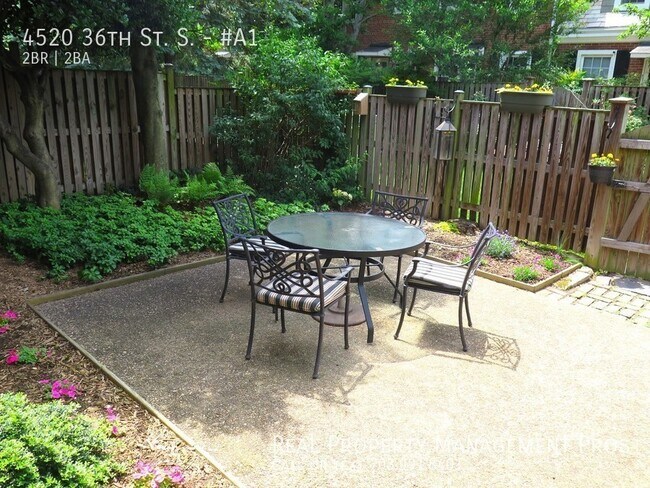 Building Photo - Fairlington End Unit with Huge Patio! 2 Dens!