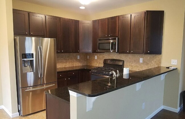 Building Photo - Spacious 3-Bedroom Townhome in Laurel Fiel...