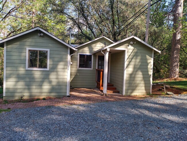 Front exterior view. - 16430 Canal Rd