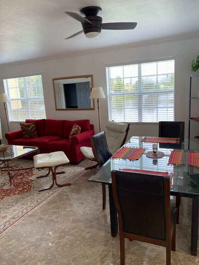 Living room. Condo is furnished! - 1030 Villagio Cir