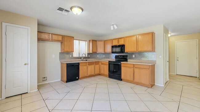 Building Photo - 12933 W Fleetwood Ln