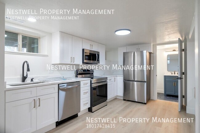 Building Photo - $500 OFF 1ST MONTH'S RENT - 2-bed Basement...