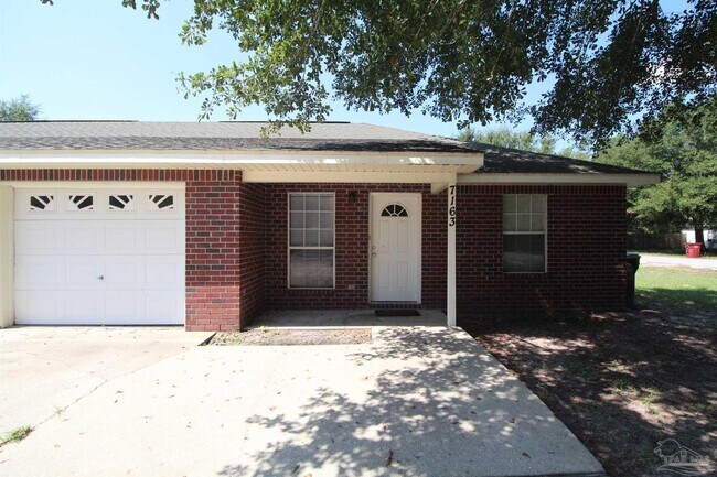 Foto del edificio - 7163 Pine Blossom Rd