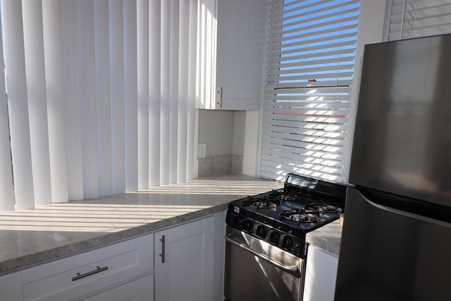 Attic Unit - Kitchen - The Victorian