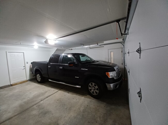 2 car garages included with 2 bdrm - Theodora Rowhomes