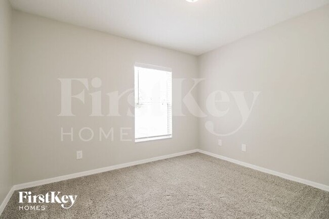 Building Photo - 5771 Cinnamon Fern Blvd