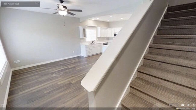 Main floor, family room and stairs - 565 Pioneer Rd