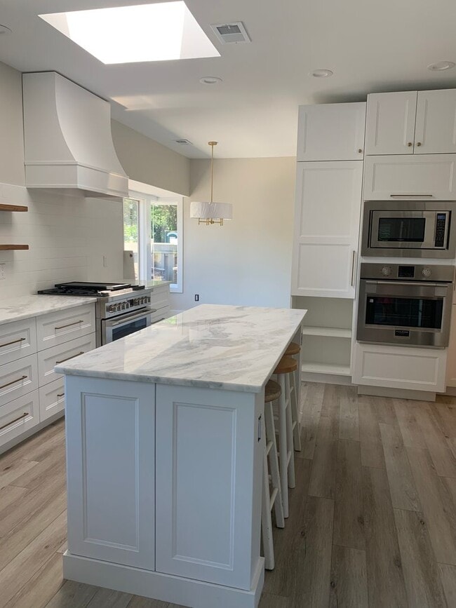 Building Photo - Private Beach Access from this Fully Remod...