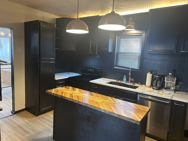 Building Photo - Beautifully Remodeled 2-Bedroom with Bonus...