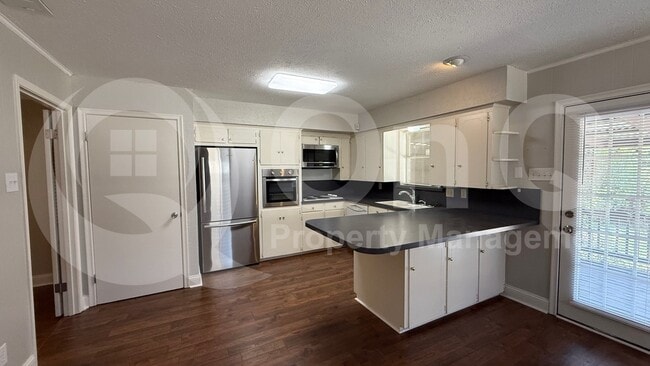 Foto del edificio - 8347 Lullwater Dr