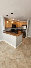 Building Photo - 10926 Royal Palm Blvd