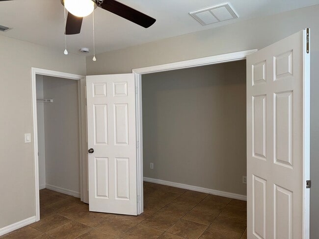 Building Photo - Experience this Cape Coral 3 bedroom 2 bath corner duplex with 1 car garage and screened in lanai.