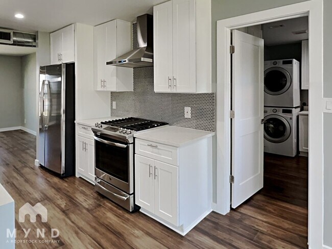 Building Photo - 6102 Bullard Dr APT A
