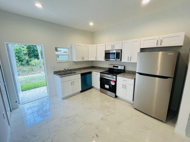 Building Photo - BRAND NEW 2/2/1-EAST LEHIGH ACRES