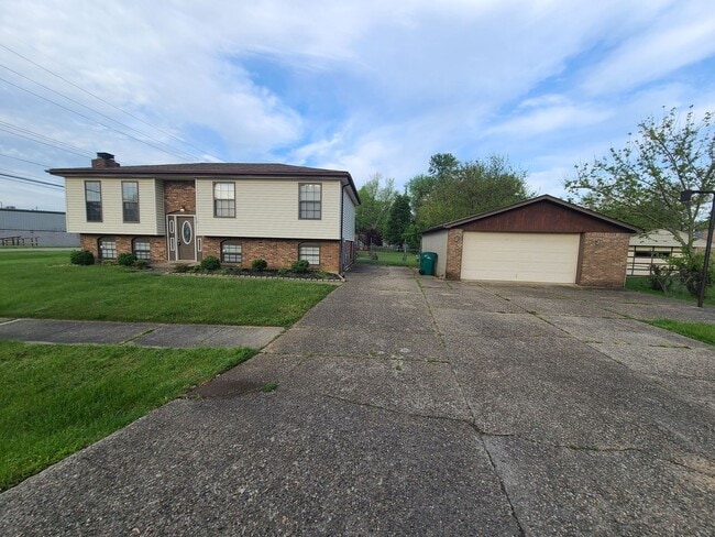 Photo - Lovely 4 bedroom 2 full bath bi-level home with large garage