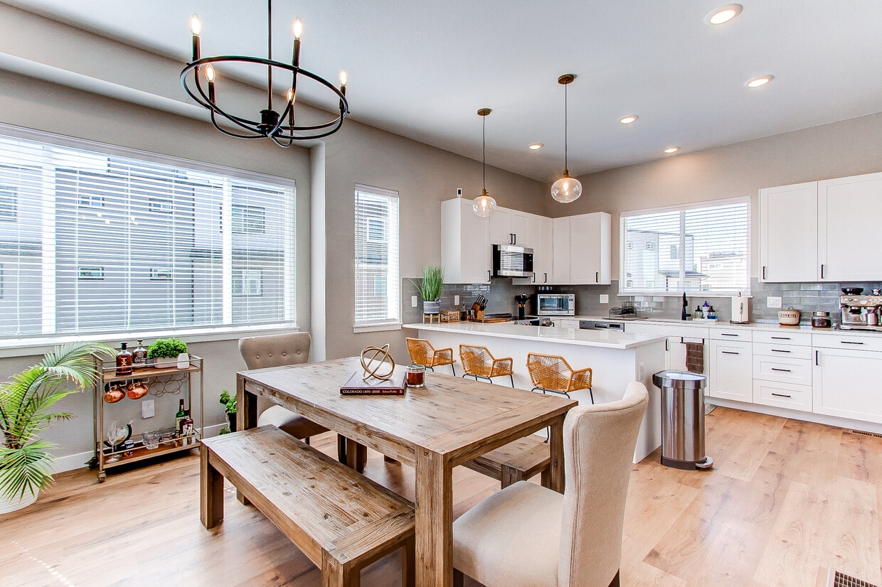 Open-concept dining room and kitchen - 8500 W 62nd Ave