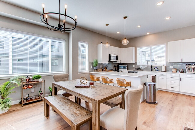 Open-concept dining room and kitchen - 8500 W 62nd Ave
