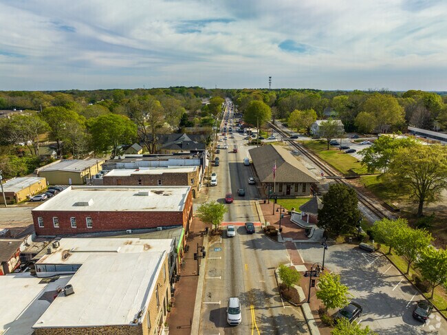 Aerial view of Stone Mountain Village over Main Street.