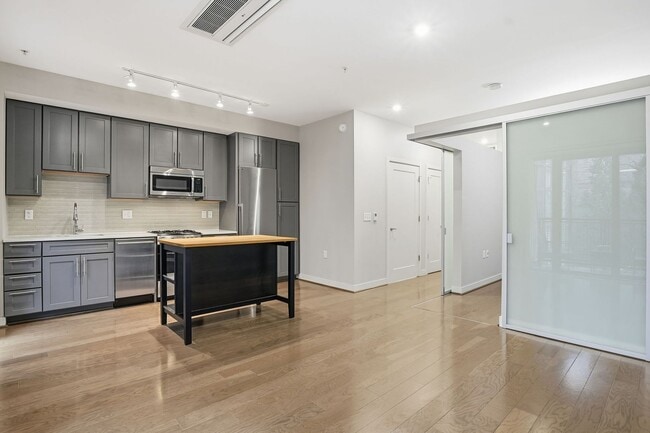 Building Photo - Modern 1BR Condo Steps to Metro, Parks & New Rec Center!