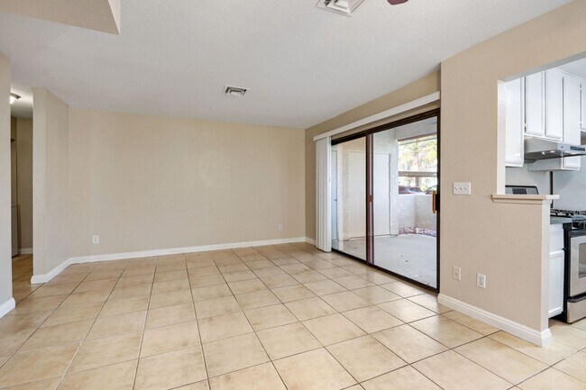 Building Photo - Beautiful 2 Primary Bedroom Downstairs Unit in Gated Community With Pool!
