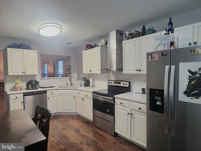 Building Photo - 7472 Merrymaker Way