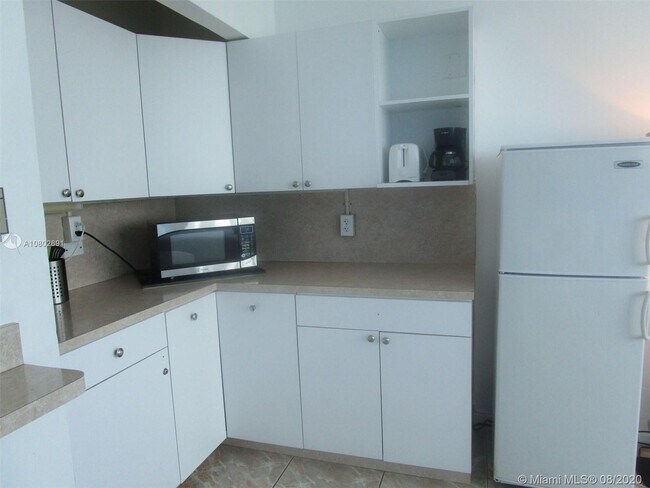 Building Photo - 5445 Collins Ave