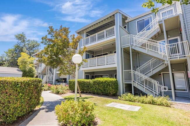 Building Photo - Top-Floor 2BR Condo for Rent – Gated Commu...