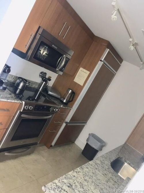 Building Photo - 10275 Collins Ave