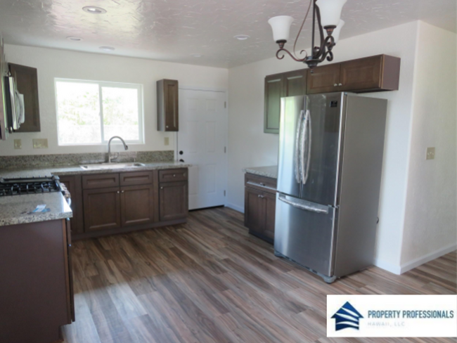 Building Photo - Stylish, custom home in Nanawale!