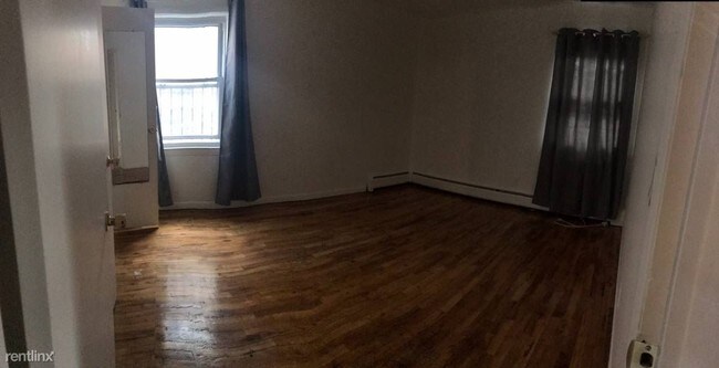 Building Photo - 130-08 60th Ave