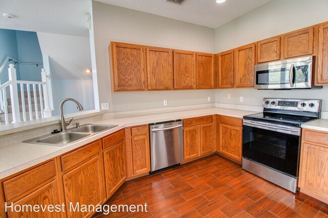 Building Photo - 3 br, 2.5 bath House - 10860 Derringer Drive