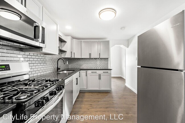Building Photo - 3 br, 1 bath House - 813 E 10th Avenue