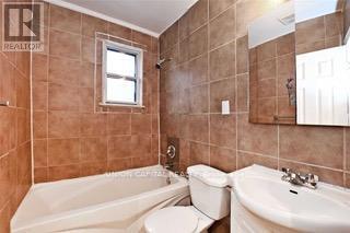 Building Photo - 100 Rajah St