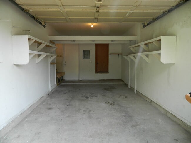 Garage with storage loft and shelving - 7806-B Chimayo Cv.,