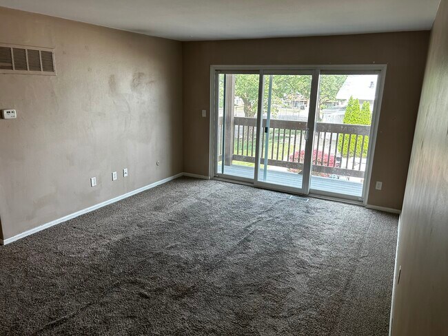 Pictures prior to new paint and flooring. - 2235 Coach Dr