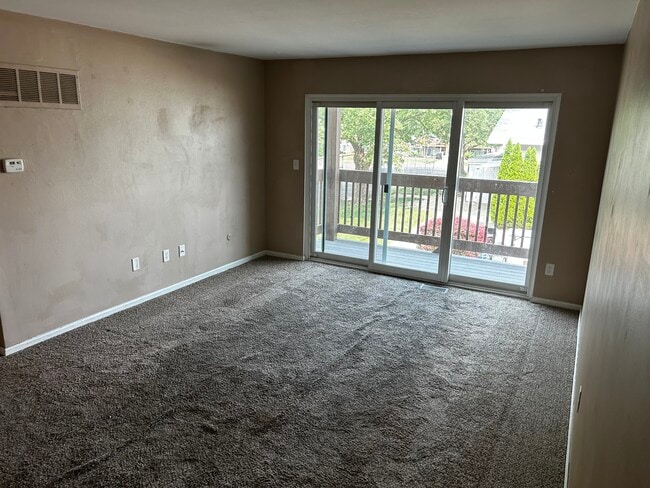 Pictures prior to new paint and flooring. - 2235 Coach Dr