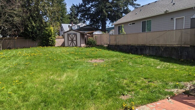 Building Photo - Spacious Three Bedroom with Large Backyard...