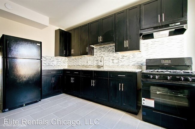 Building Photo - 4 br, 1 bath Apartment - 7542 S. Colfax Ave.