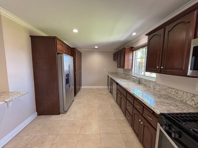 Building Photo - Beautiful Buena Park 4 Bedroom home with all kinds of upgrades!!