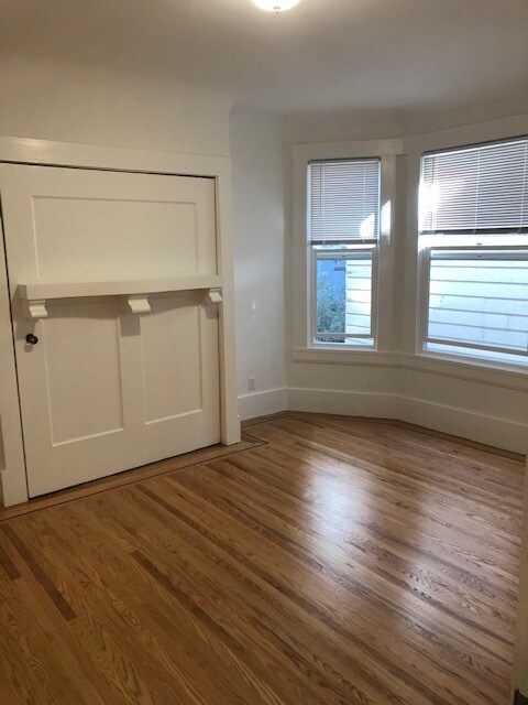 Living room with Bed put away - 1181 Clay St