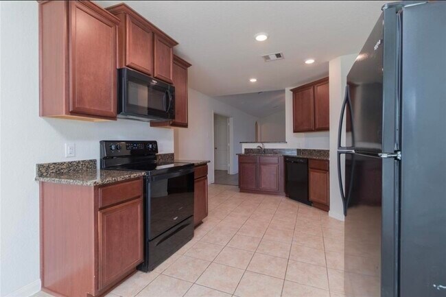 Building Photo - 15310 Albert Oak Dr
