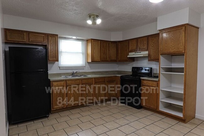 Building Photo - 1403-1403 Jeanette Ave