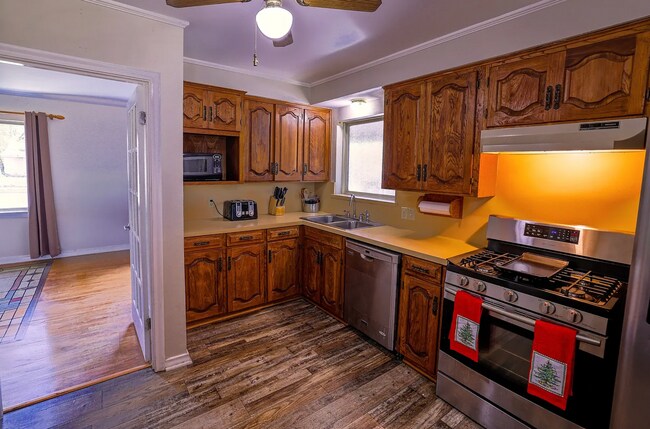 Building Photo - **WELL-MAINTAINED HOME WITH FENCED BACKYARD WITH TWO STORAGE BUILDINGS AVAILABLE FOR RENT FOR THE...