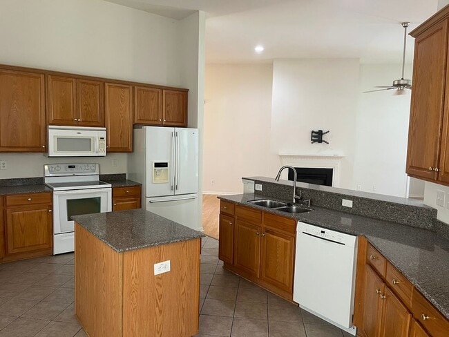Building Photo - Available now. Great 4BR/3BA Home in Carol...