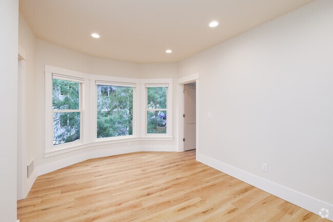 3BR, 1BA - 900SF - Living Room - The Caroline