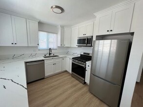 Building Photo - 327 S Ave 57