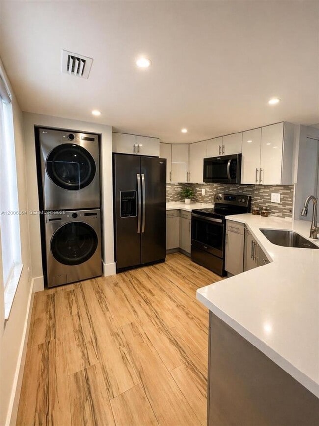 Photo - 8590 NW 3rd St Townhome