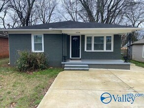 Building Photo - 1236 Oshaughnessy Ave NE