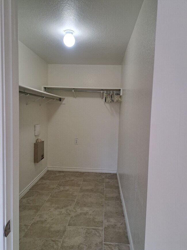 Master bedroom walk-in closet - 6511 Flatstone Pass