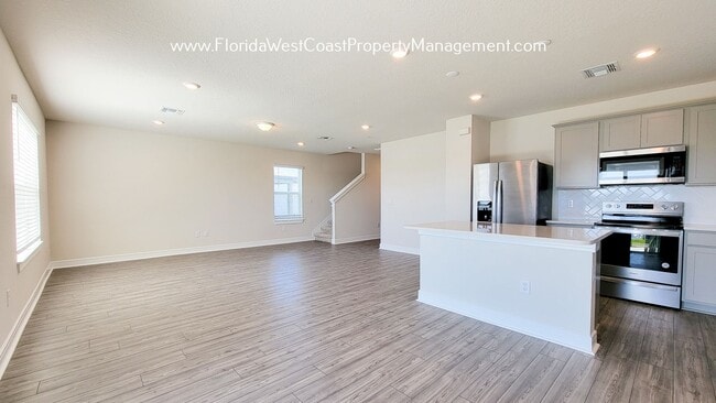 Building Photo - OUTSTANDING LARGE 4 BEDROOM/ 3 BATH HOME IN ISLES AT BAYVIEW! LARGE FLEX SPACE PLUS LAKEIVEWS!